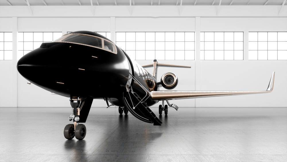 Private,Business,Jet,Parked,At,White,Luminous,Maintenance,Hangar,And